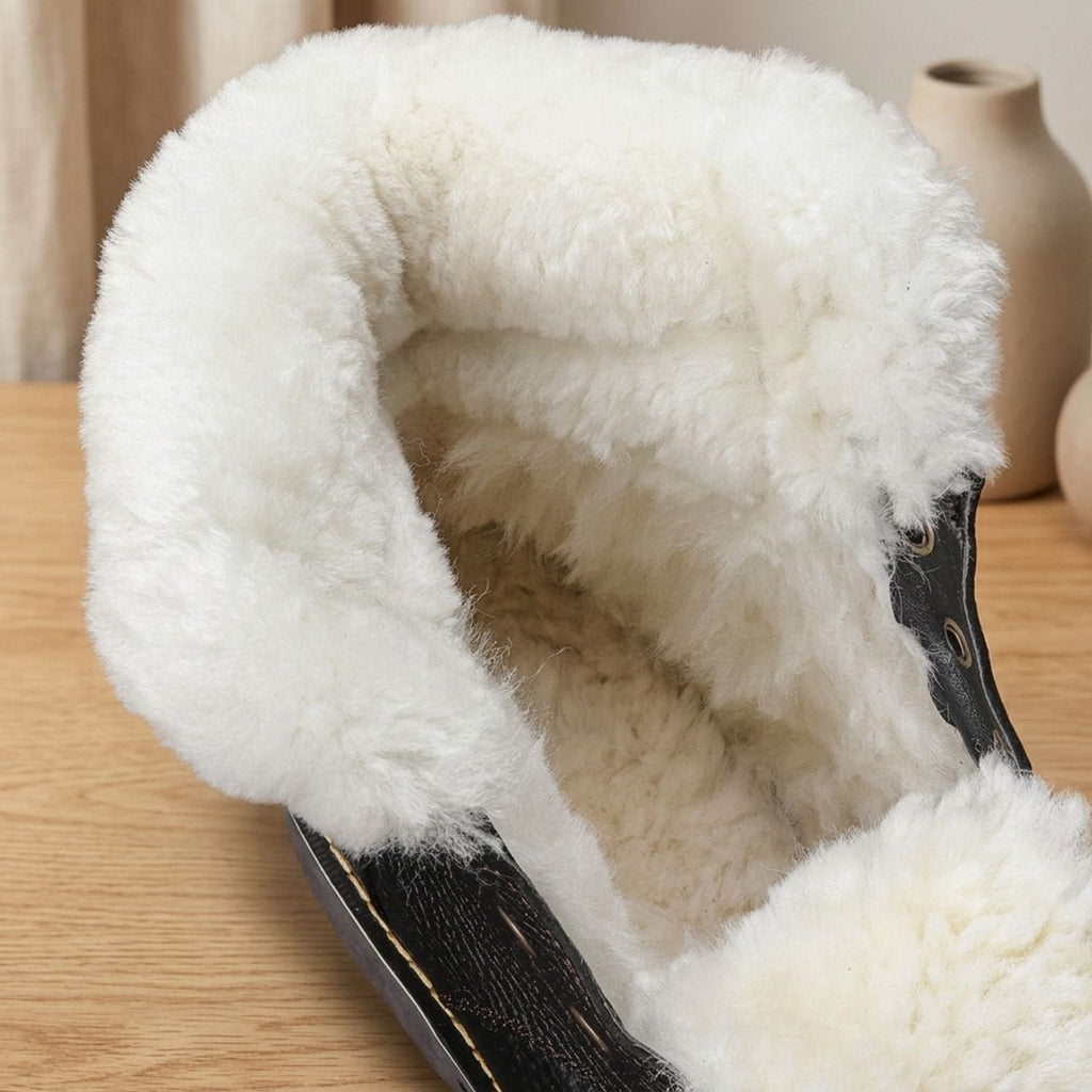 Men's leather winter boots on foot